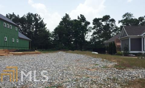 2028 Trimleston Road, Unit 14 Statham, GA 30666 - Photo 1 of 1 a backyard of a house