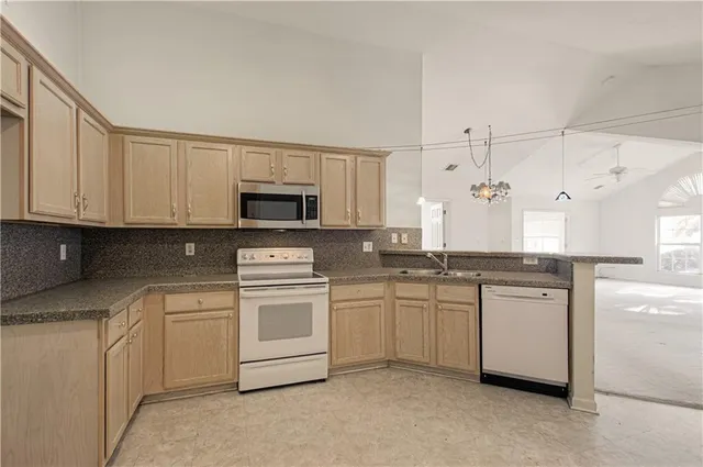 $325,000 | 6115 Northeast Kensington Drive, Lee's Summit, MO 64064