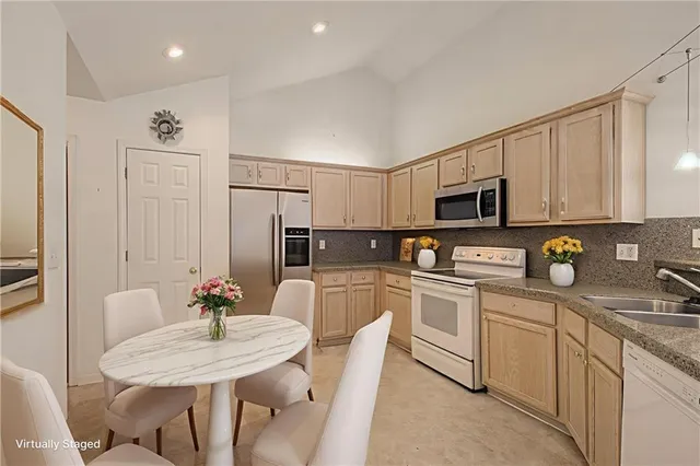 $325,000 | 6115 Northeast Kensington Drive, Lee's Summit, MO 64064