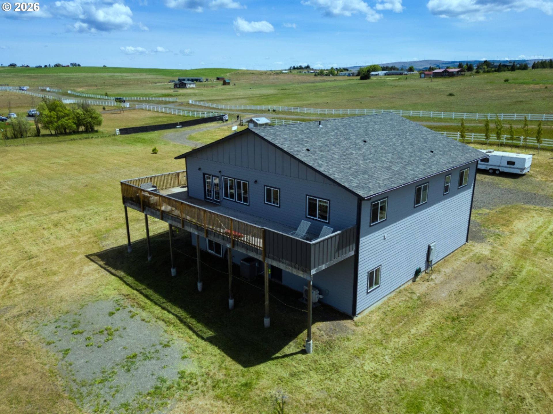19 Inverness Road Goldendale, WA 98620 - Photo 7 of 48 a terrace with a table and chairs