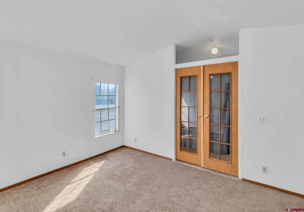 a view of an empty room and window