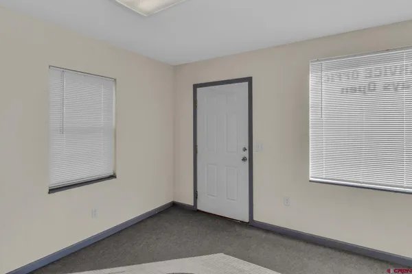 a view of an empty room with window