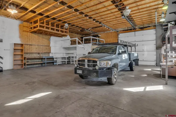 a view of a garage with storage