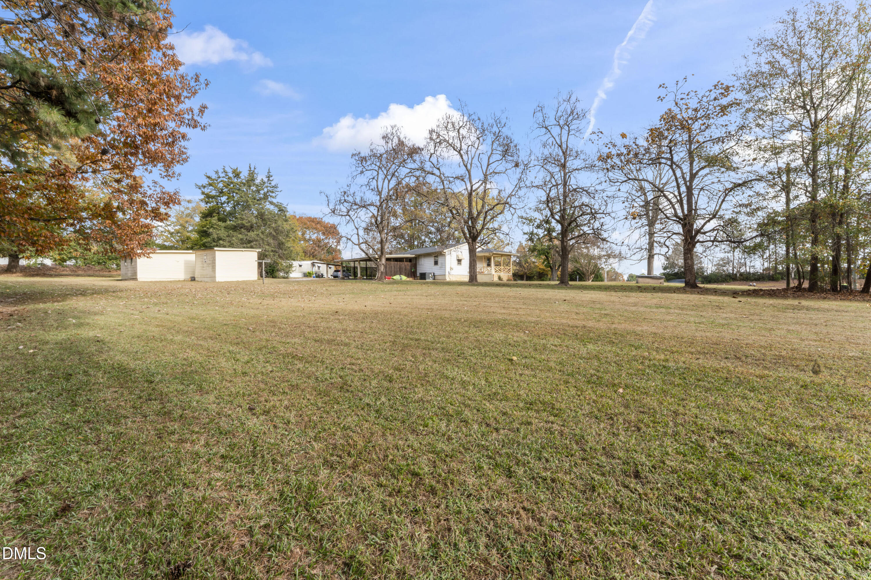 12329 Old Falls Of Neuse Road Wake Forest, NC 27587 - Photo 11 of 48 a view of yard with trees and houses