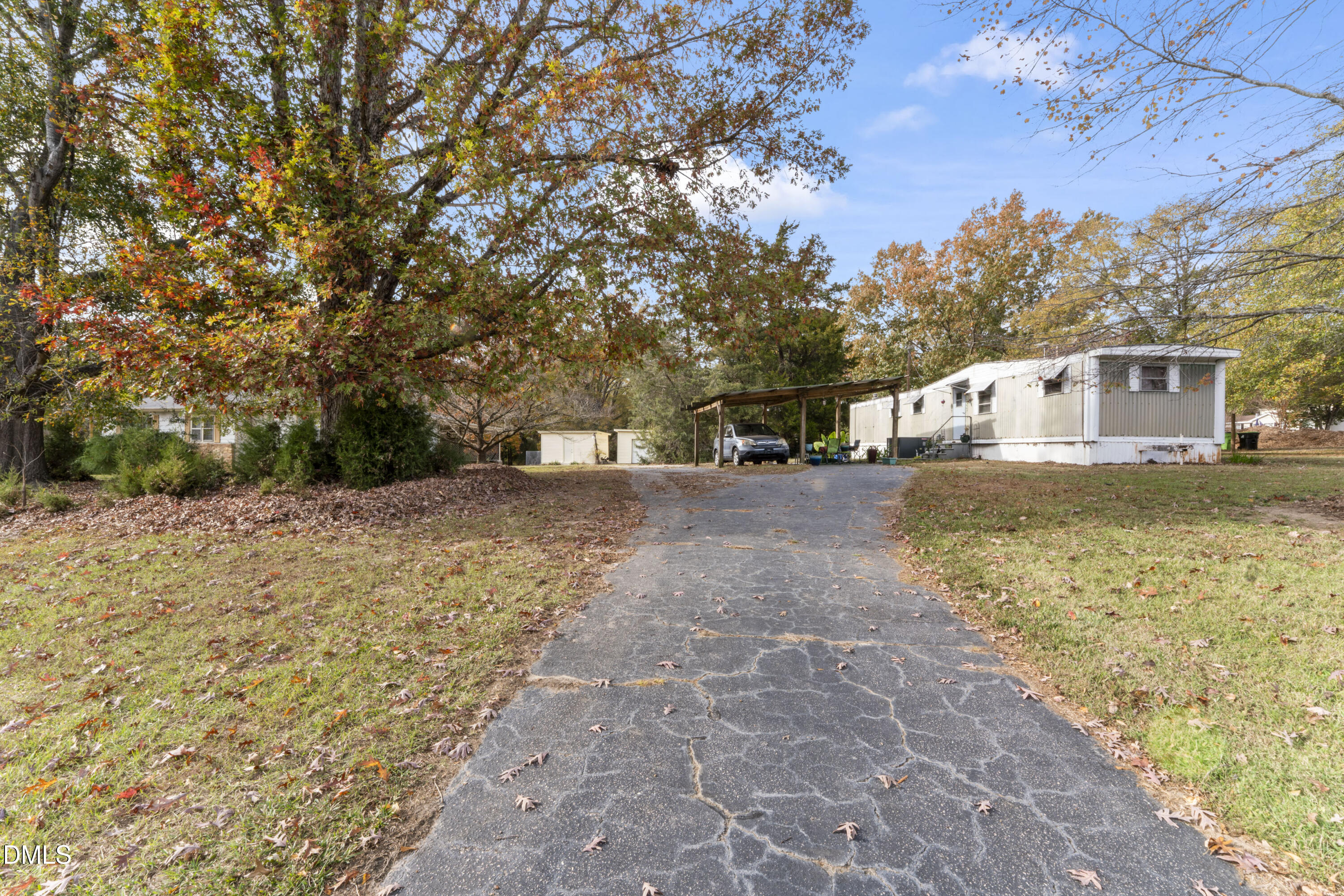 12329 Old Falls Of Neuse Road Wake Forest, NC 27587 - Photo 14 of 48 a view of a house with a yard