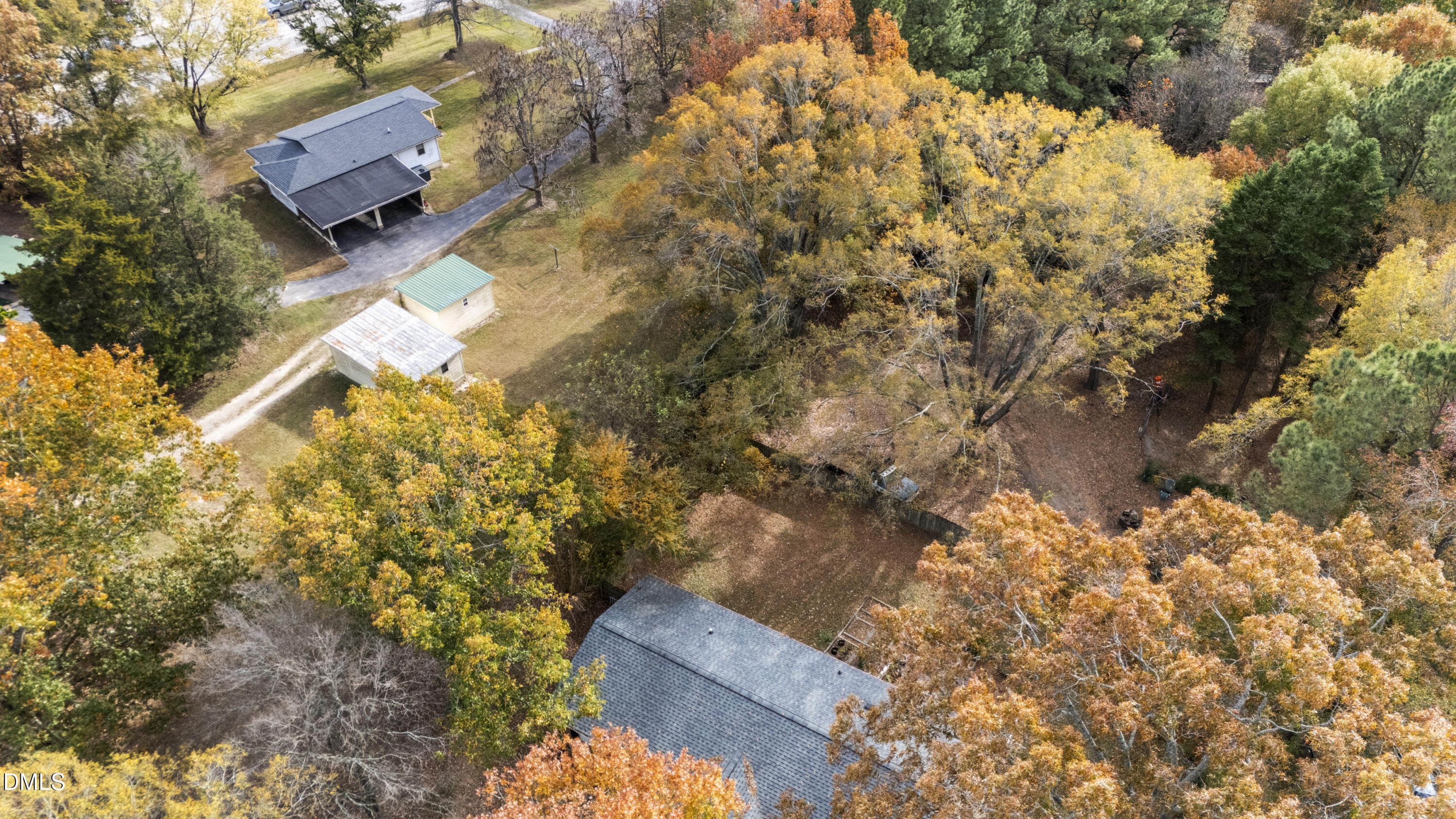 12329 Old Falls Of Neuse Road Wake Forest, NC 27587 - Photo 27 of 48 a view of a tree with a yard