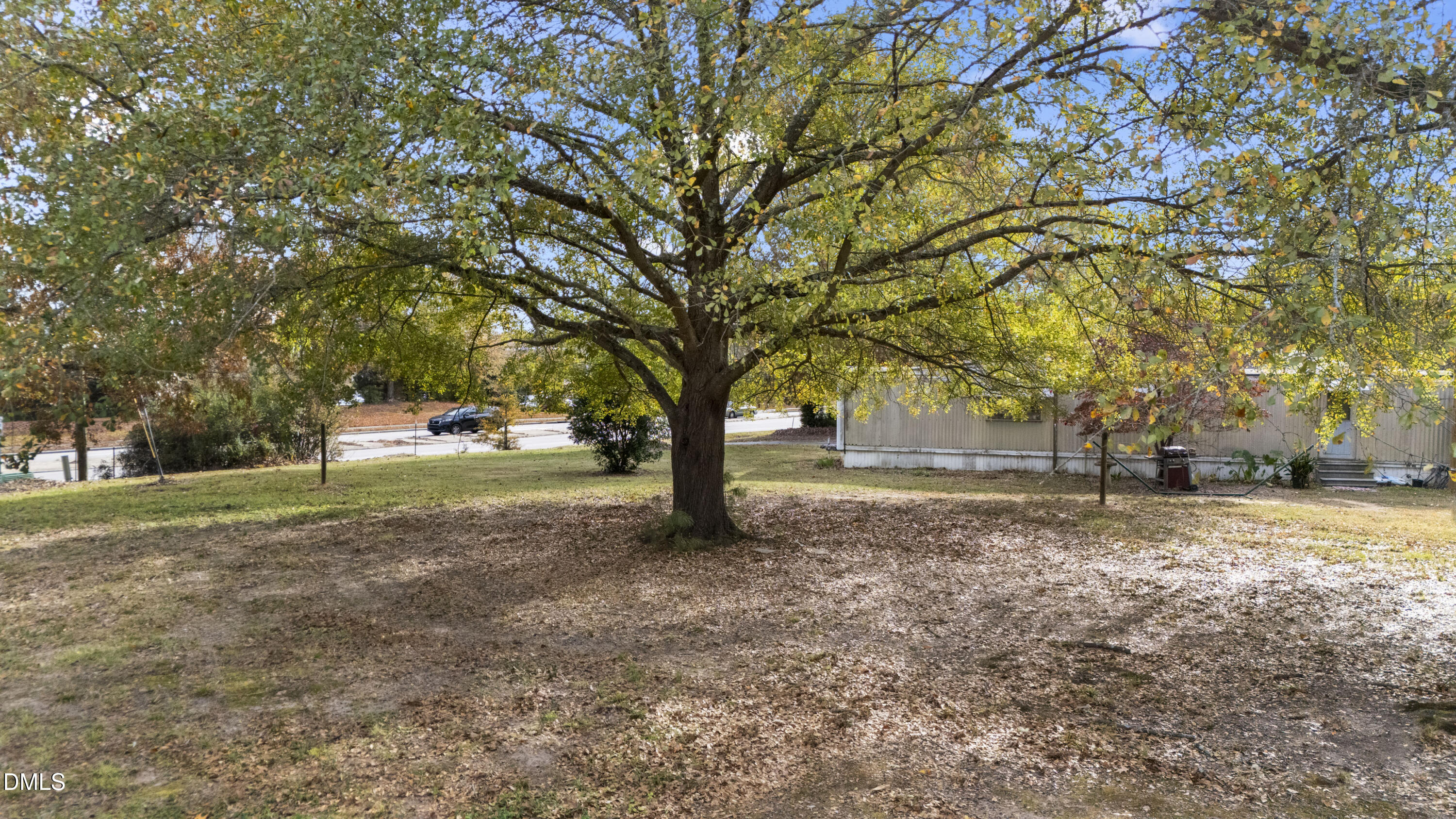 12329 Old Falls Of Neuse Road Wake Forest, NC 27587 - Photo 32 of 48 a view of a yard with tree s