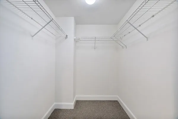 a view of a room with racks on the wall