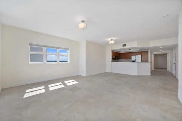 a view of a kitchen with a sink