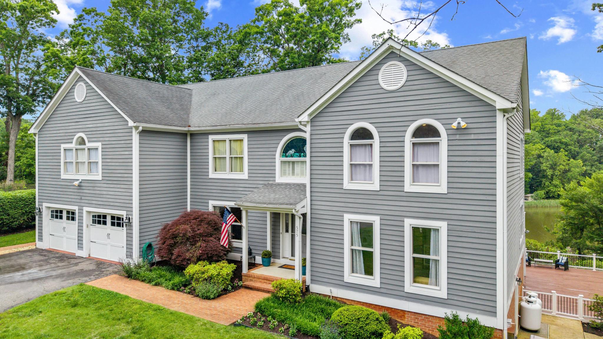 575 Laurel Road Riva, MD 21140 - Photo 6 of 77 Charming gray home with lush surroundings.