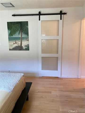 a view of a chairs and table in the patio