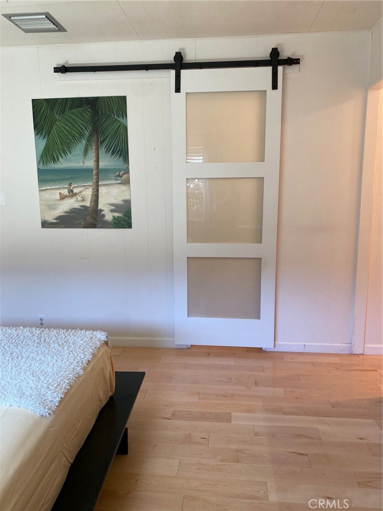 1595 Los Osos Valley Road, Unit 8A Los Osos, CA 93402 - Photo 15 of 73 Barn door primary bath/bedroom