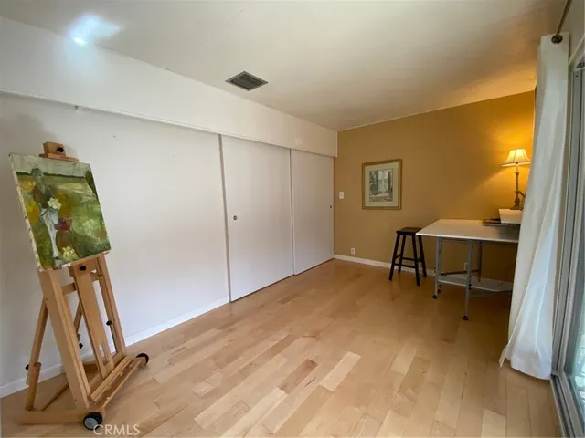 a view of a swimming pool with a lounge chairs