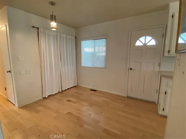 a close view of a stove a microwave oven and cabinets