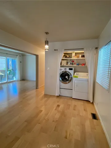 a stove top oven sitting inside of a kitchen