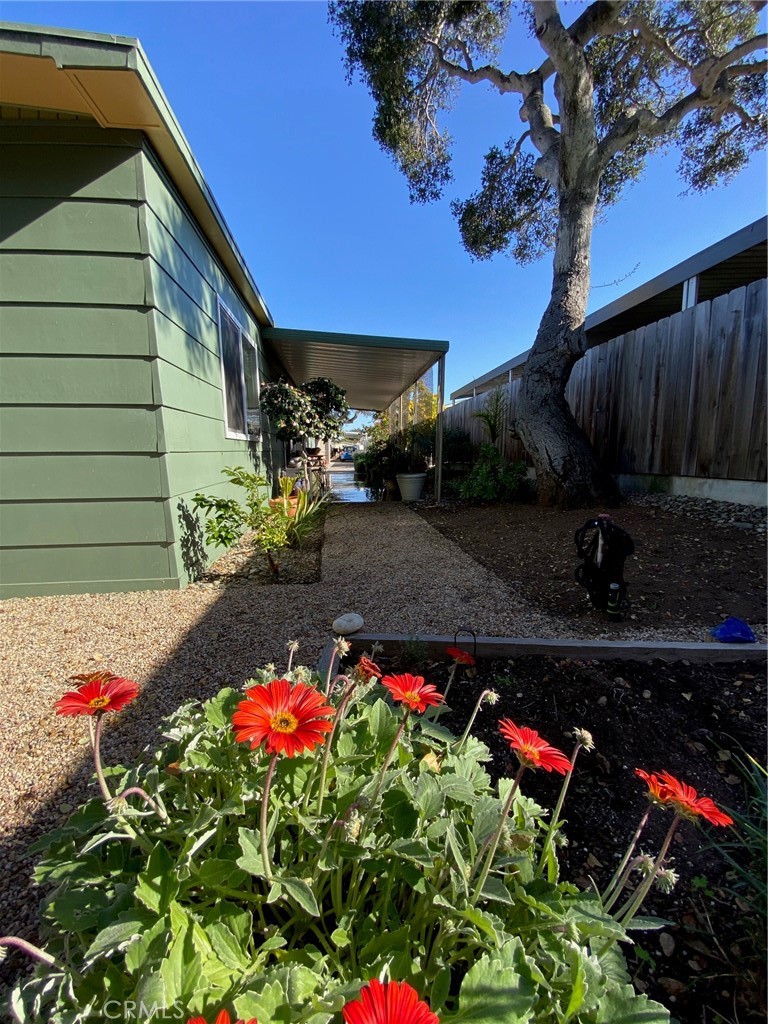 1595 Los Osos Valley Road, Unit 8A Los Osos, CA 93402 - Photo 25 of 73 a view of a backyard with flowers