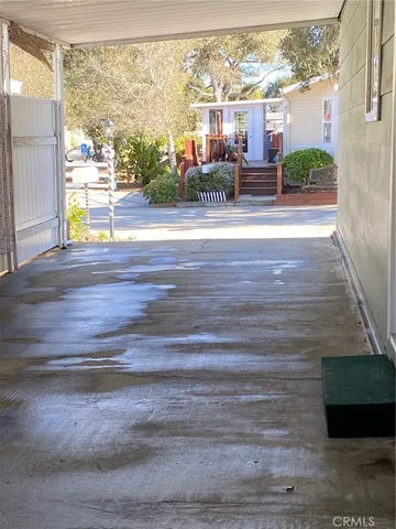 a bathroom with a sink and mirror with painted walls