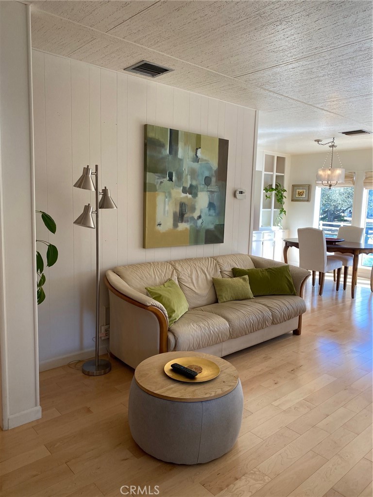 1595 Los Osos Valley Road, Unit 8A Los Osos, CA 93402 - Photo 3 of 73 a living room with furniture and a potted plant