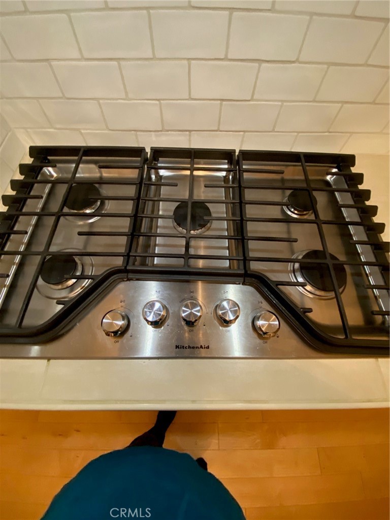 1595 Los Osos Valley Road, Unit 8A Los Osos, CA 93402 - Photo 34 of 73 a stove top oven sitting inside of a kitchen