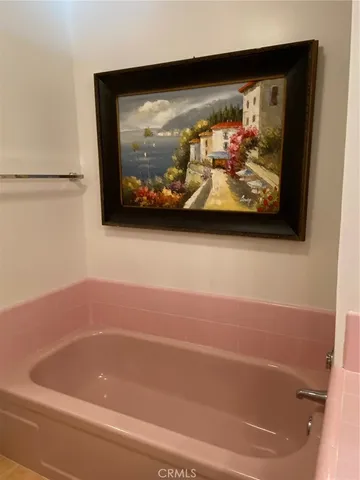 a backyard of a house with barbeque oven