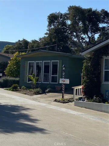 a kitchen with stainless steel appliances granite countertop a stove and a refrigerator
