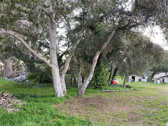 a room with dining table and chairs