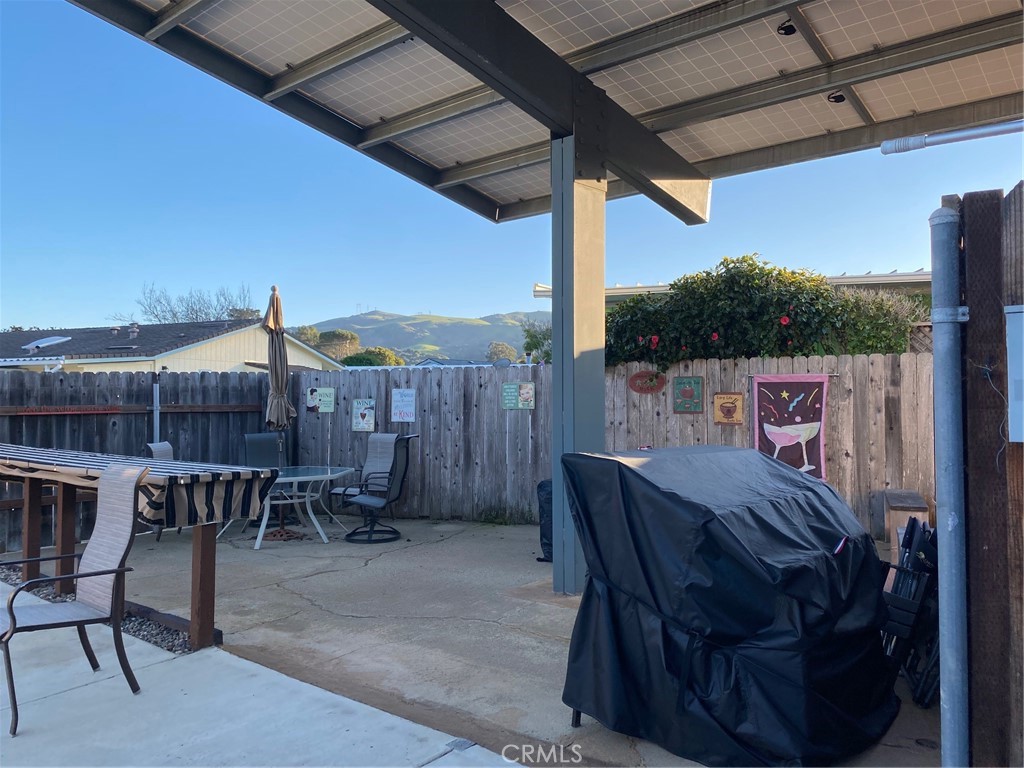 1595 Los Osos Valley Road, Unit 8A Los Osos, CA 93402 - Photo 53 of 73 a view of balcony with furniture and a potted plant
