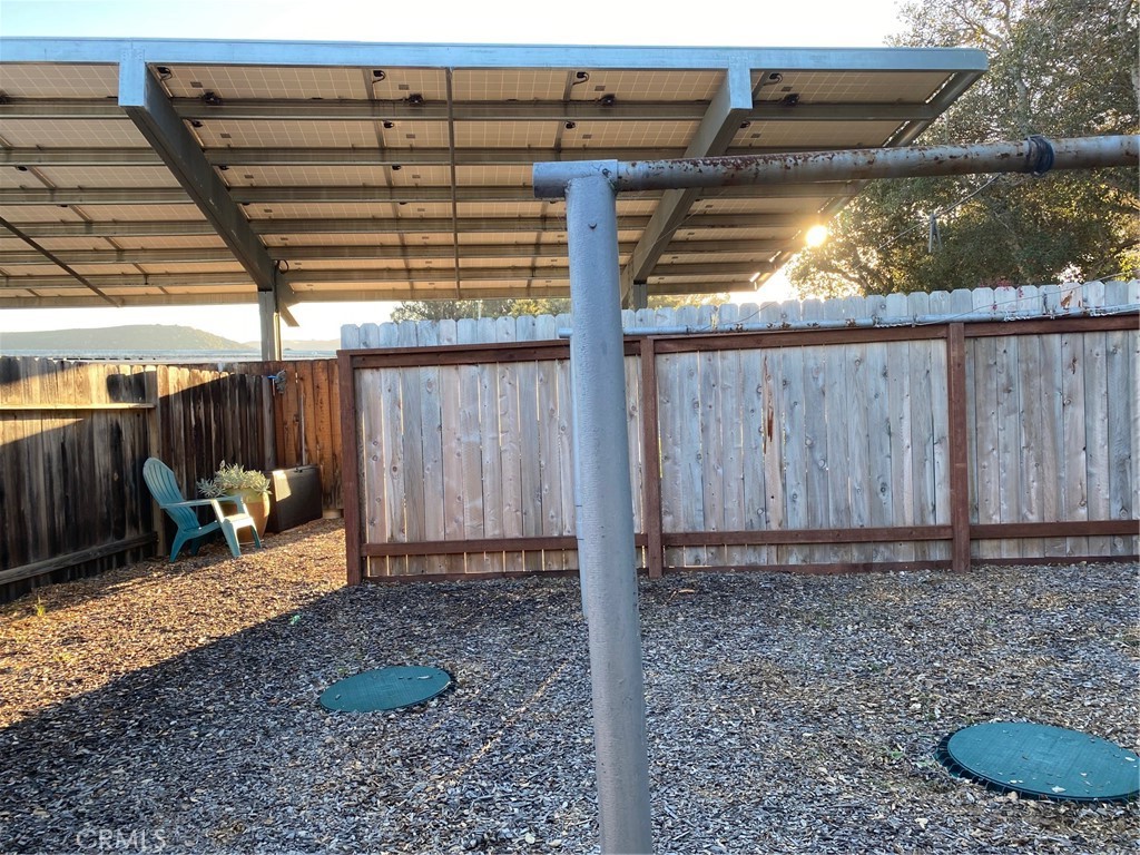 1595 Los Osos Valley Road, Unit 8A Los Osos, CA 93402 - Photo 56 of 73 a backyard of a house with barbeque oven