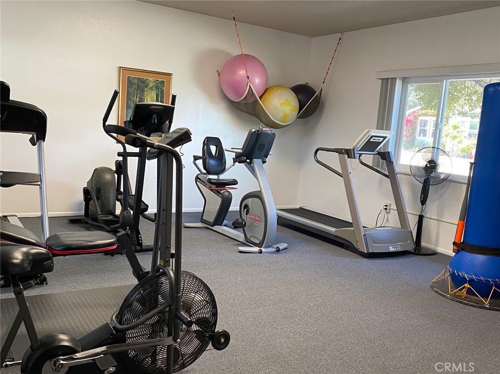 1595 Los Osos Valley Road, Unit 8A Los Osos, CA 93402 - Photo 62 of 73 a view of a room with gym equipment
