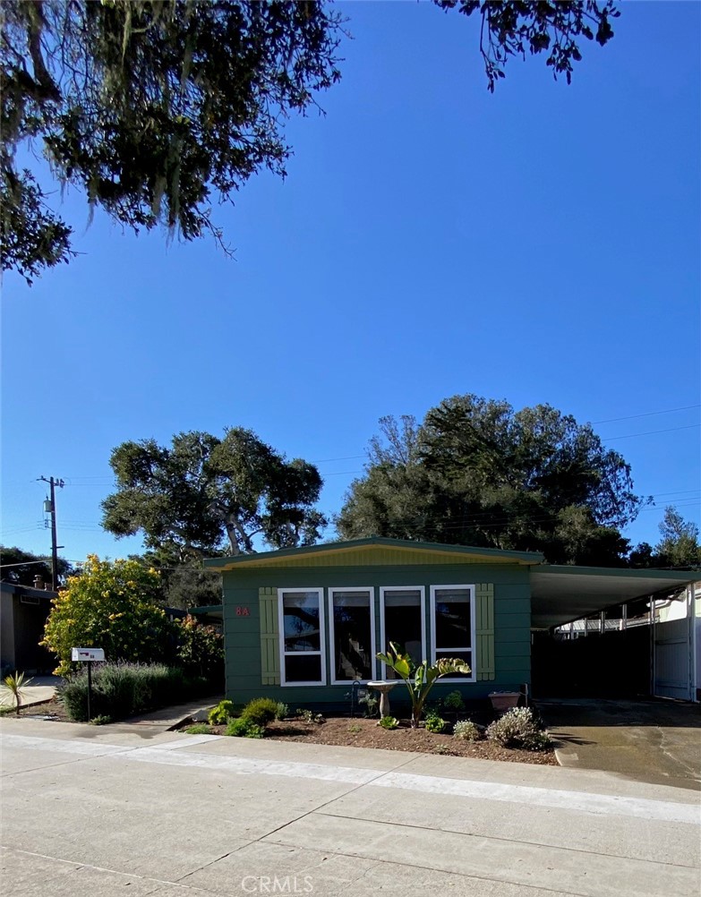 1595 Los Osos Valley Road, Unit 8A Los Osos, CA 93402 - Photo 67 of 73 front view of a house with a yard