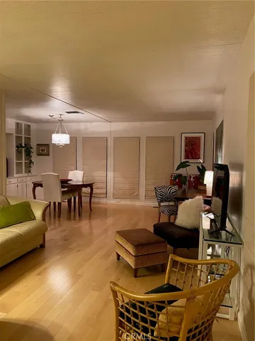 a kitchen with stainless steel appliances a refrigerator sink and cabinets
