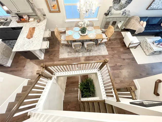 a view of stairs and with wooden floor