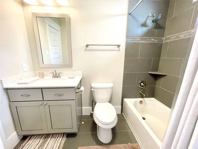 a view of a chairs and table in backyard