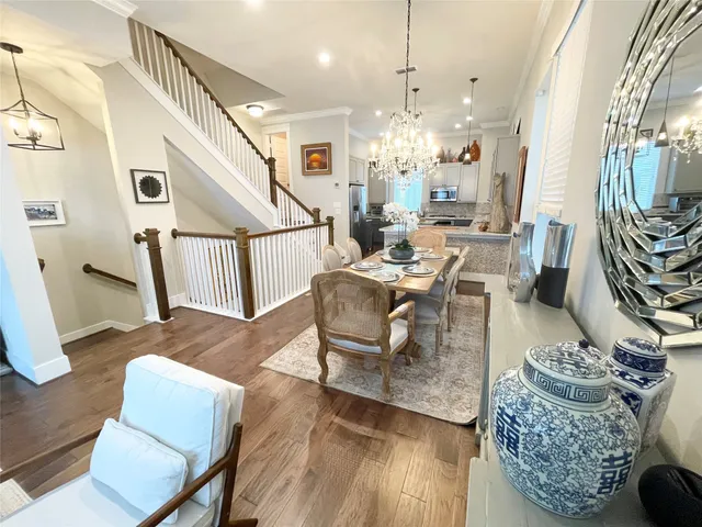 a bathroom with a sink mirror and toilet