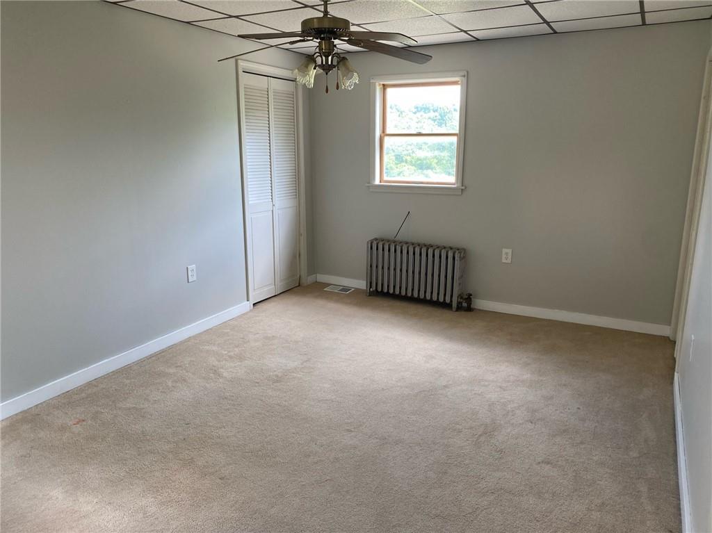 361 Searight Herbert Road Uniontown, PA 15401 - Photo 12 of 14 a view of an empty room with a window
