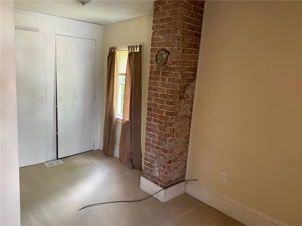 361 Searight Herbert Road Uniontown, PA 15401 - Photo 10 of 14 an empty room with windows