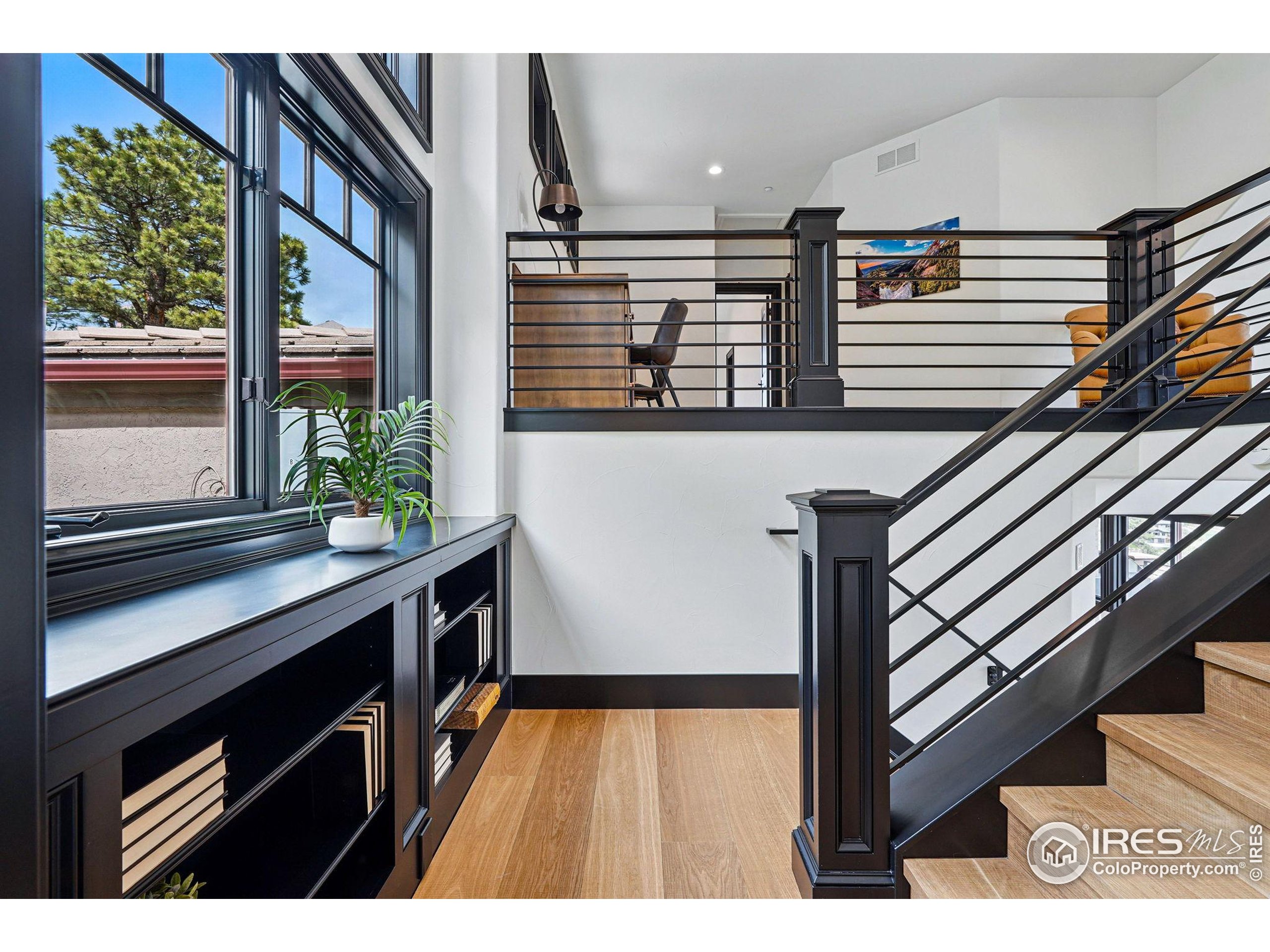 166 Valley View Way Boulder, CO 80304 - Photo 18 of 40 a view of entryway and hall with wooden floor
