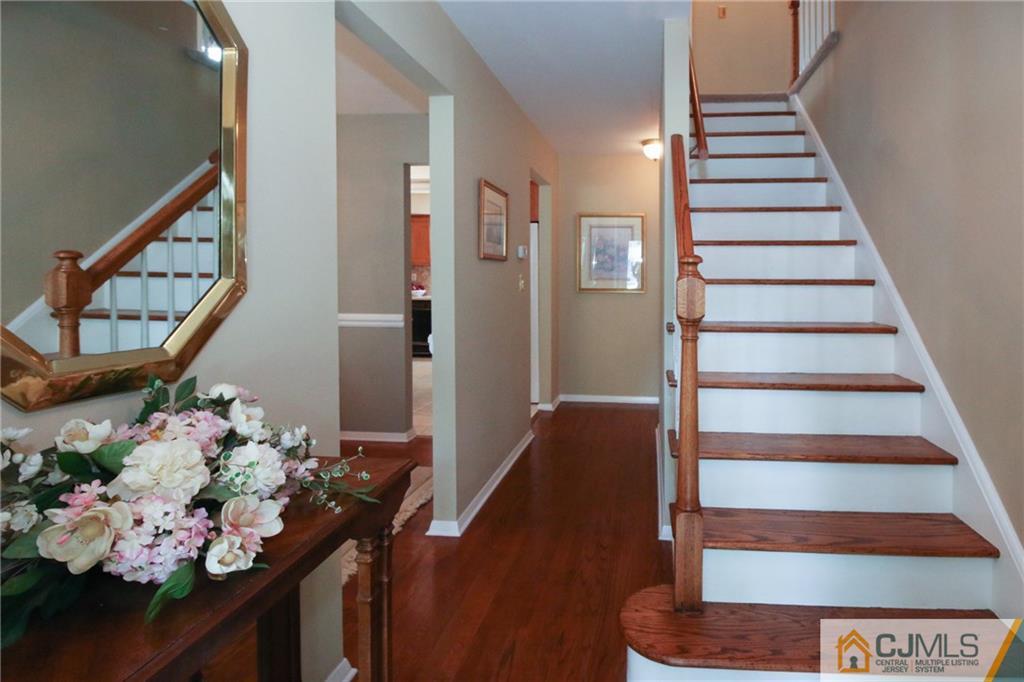 20 Corey Drive Ewing, NJ 08618 - Photo 2 of 25 a view of entryway and hall with wooden floor