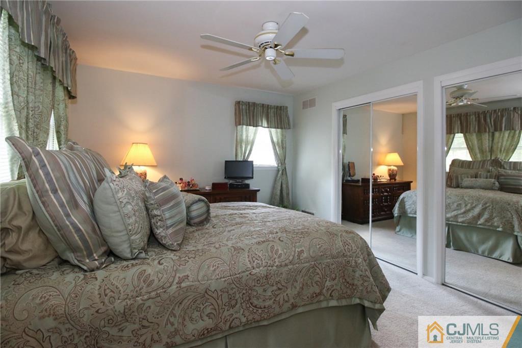 20 Corey Drive Ewing, NJ 08618 - Photo 11 of 25 a bedroom with a bed and window