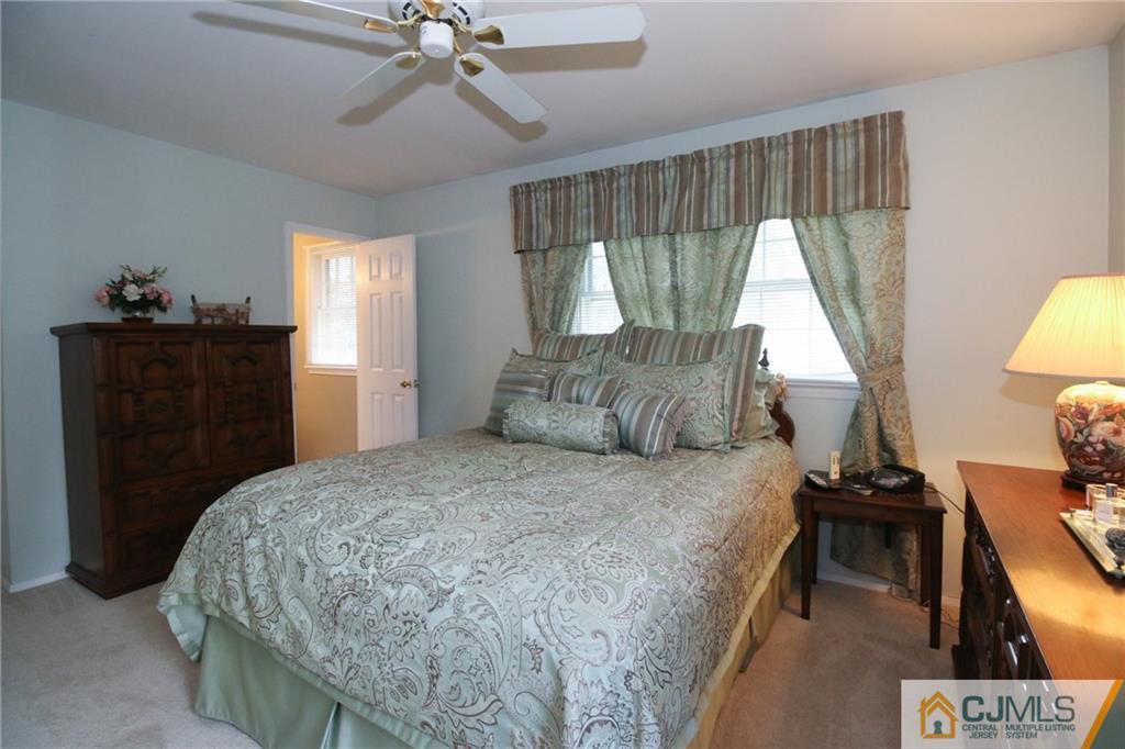 20 Corey Drive Ewing, NJ 08618 - Photo 13 of 25 a bedroom with a bed and a dresser