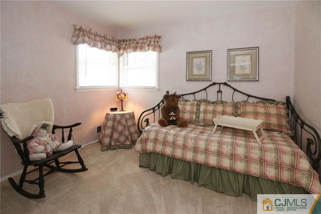20 Corey Drive Ewing, NJ 08618 - Photo 16 of 25 a bedroom with bed and a window