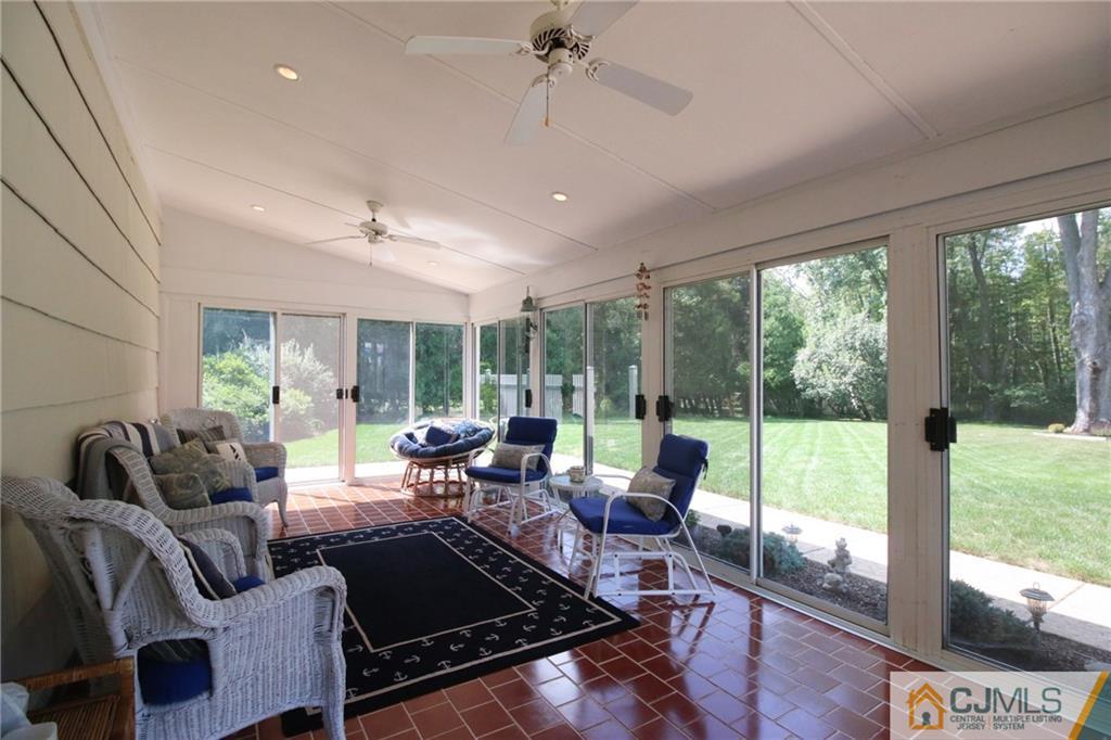 20 Corey Drive Ewing, NJ 08618 - Photo 22 of 25 a living room with furniture and a floor to ceiling window