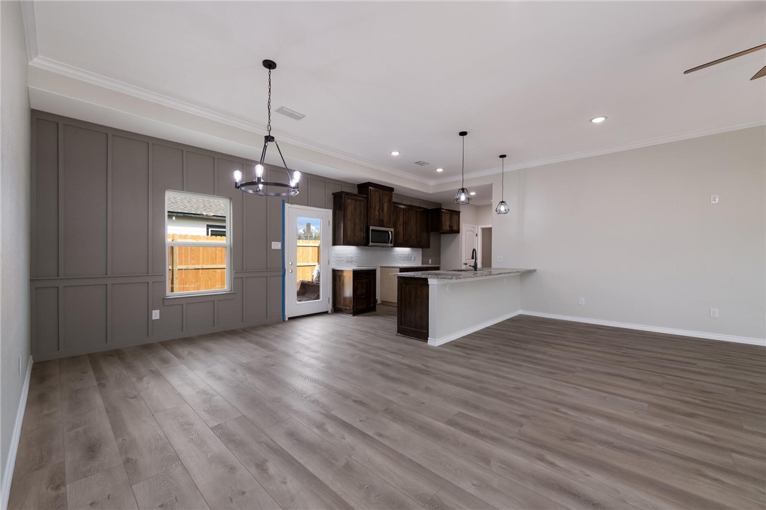 402 F Street Meridian, TX 76665 - Photo 15 of 32 a view of kitchen with stove and wooden floor