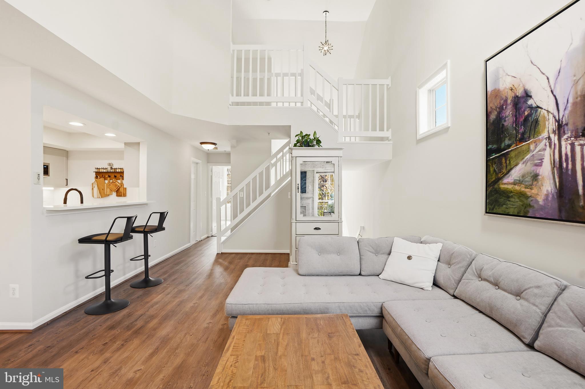 1365 Garden Wall Circle, Unit 703 Reston, VA 20194 - Photo 7 of 31 Fantastic bar seating at kitchen pass through
