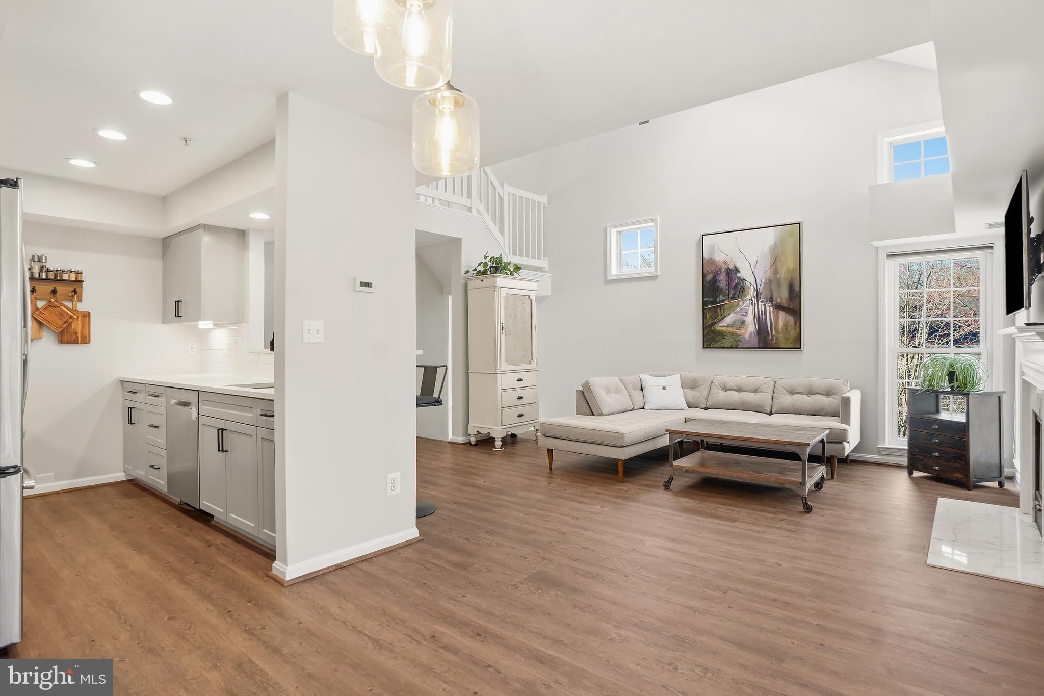 1365 Garden Wall Circle, Unit 703 Reston, VA 20194 - Photo 8 of 31 Dining area open to living and kitchen