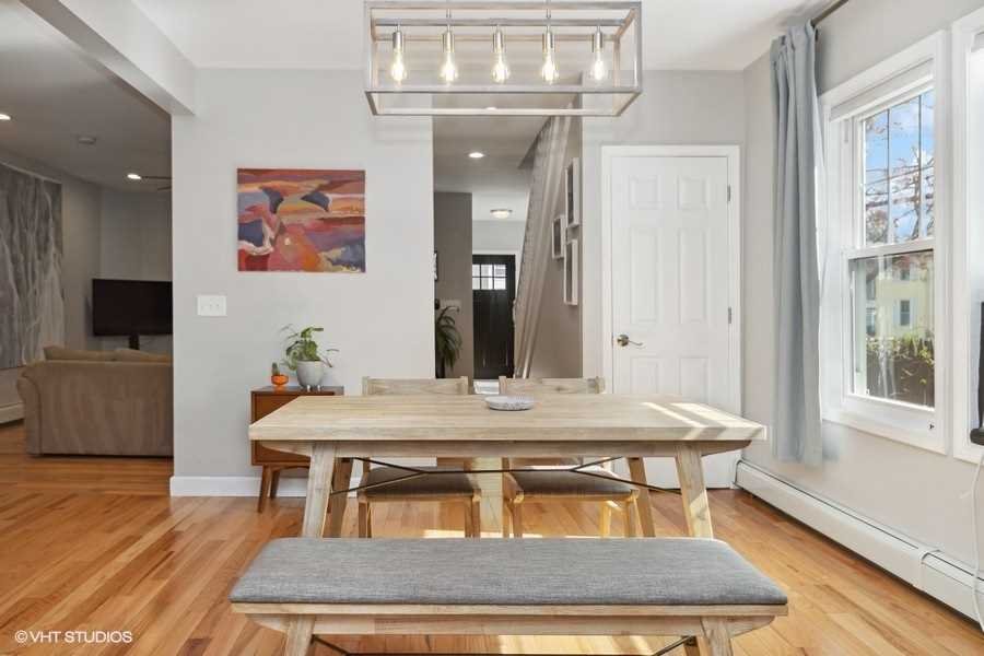 263 Fishkill Avenue Beacon, NY 12508 - Photo 16 of 36 a dining room with a table and chairs