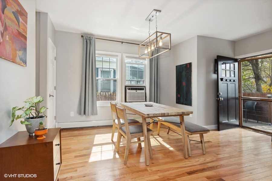 263 Fishkill Avenue Beacon, NY 12508 - Photo 17 of 36 a view of a dining room with furniture window and wooden floor