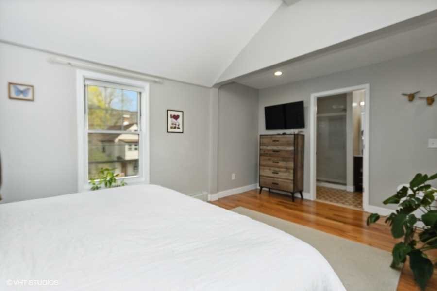 263 Fishkill Avenue Beacon, NY 12508 - Photo 22 of 36 a bedroom with a bed and a dresser