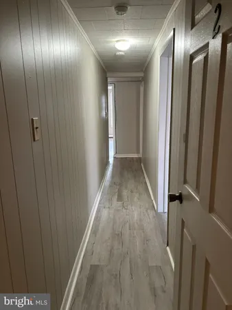 a view of hallway with stairs