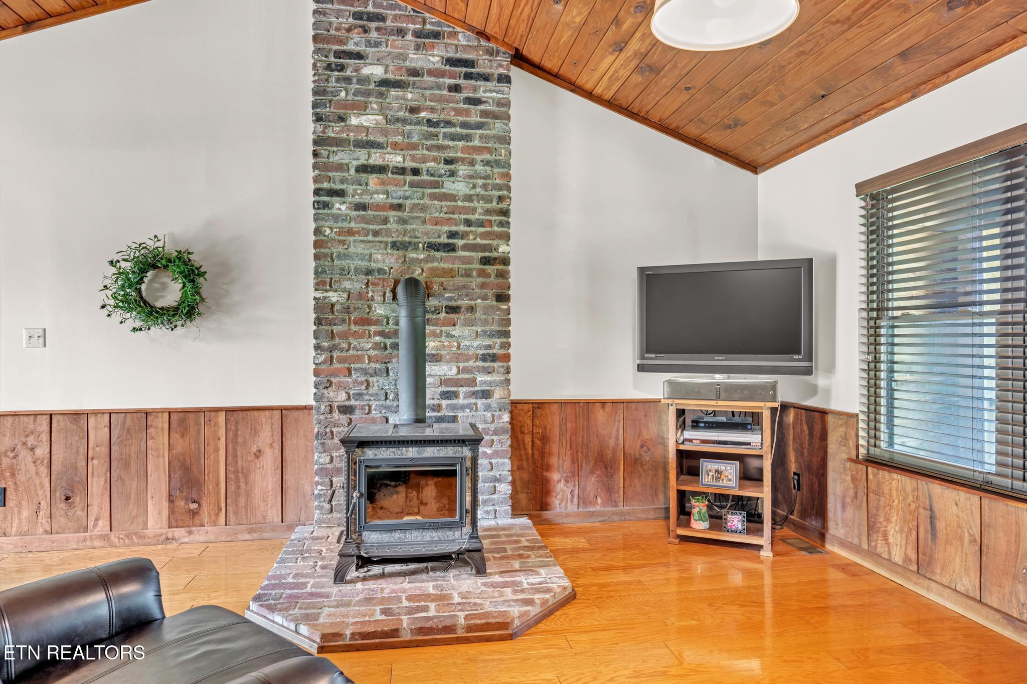 325 Lone Ridge Lane Clinton, TN 37716 - Photo 33 of 51 Wood burning stove Family Room